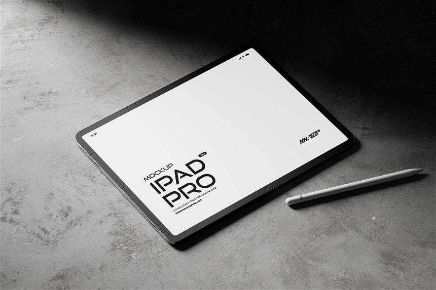 Free Ipad Pro Mockup With a Pencil in a Dark Environment