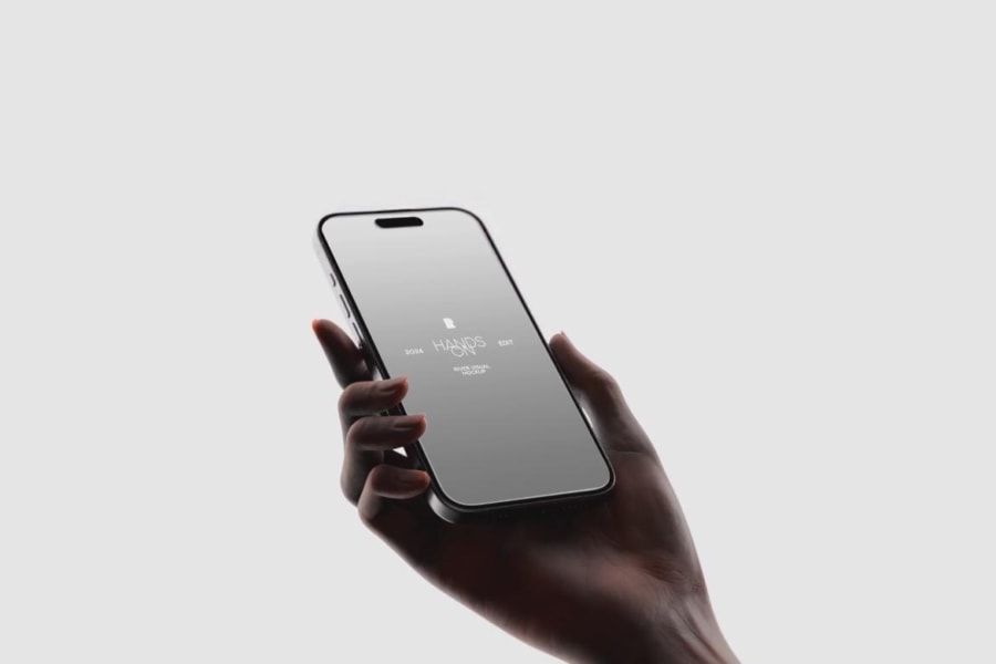 Free Hand Holding iPhone 15 Pro Animated Mockup
