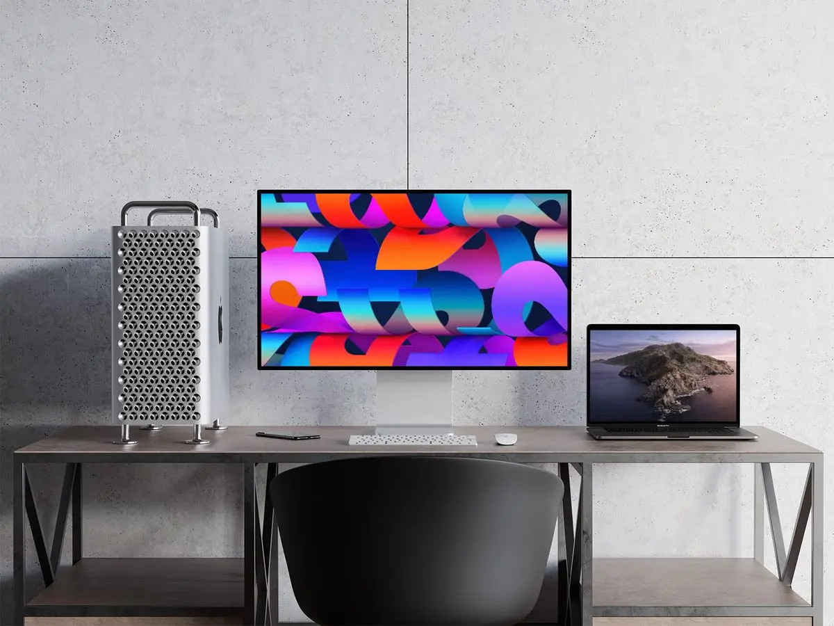 Mac Pro and MacBook Pro Mockup on a Table
