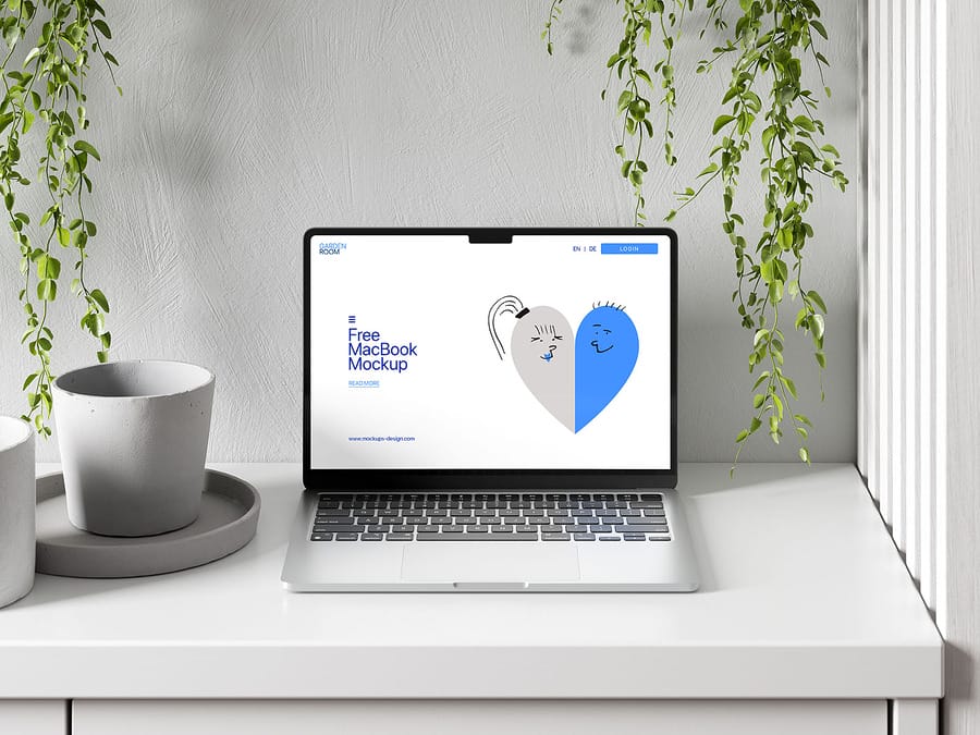 4 Free MacBook Air on a Table Mockup