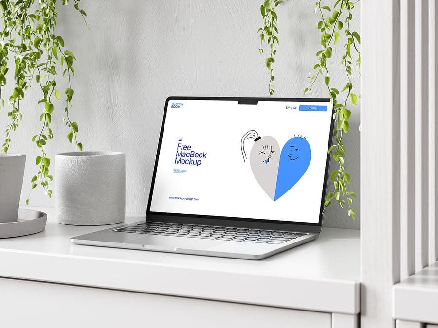 4 Free MacBook Air on a Table Mockup