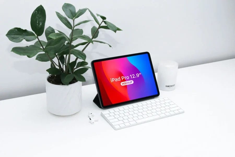 free iPad pro mockup on modern white workspace