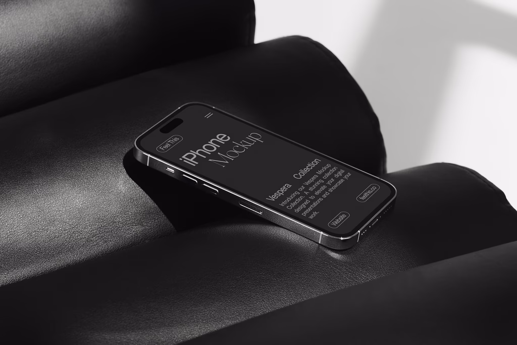 free iPhone 14 pro mockup on lounge chair