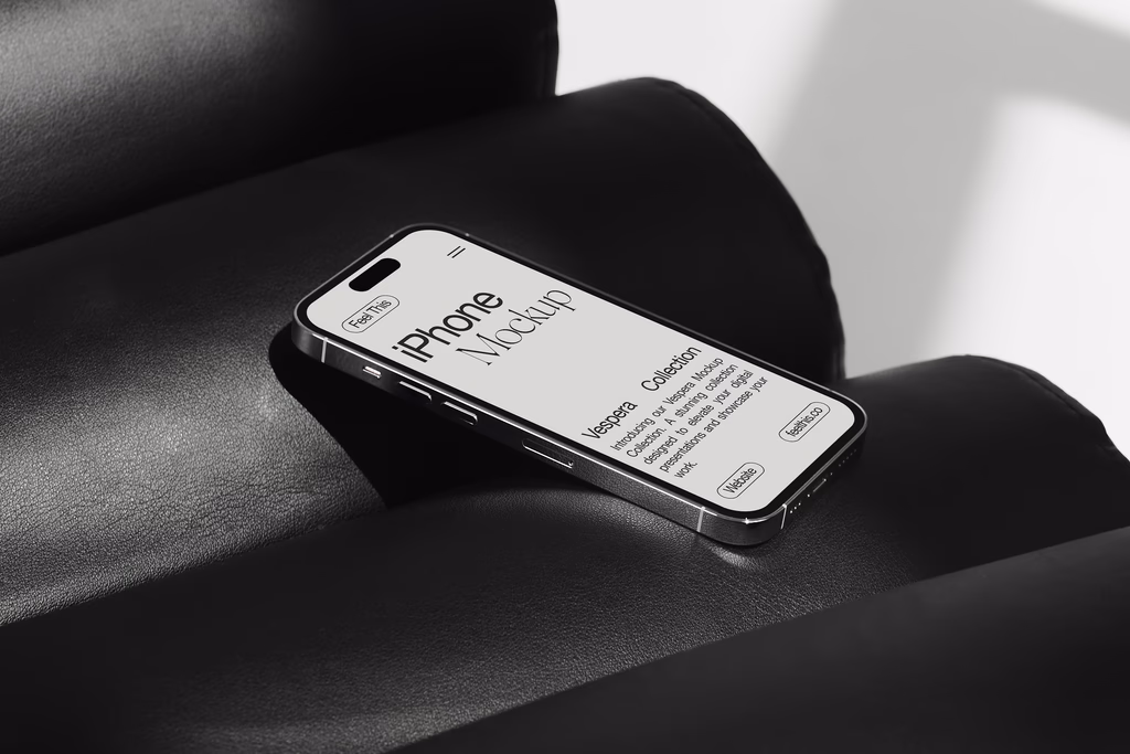 free iPhone 14 pro mockup on lounge chair