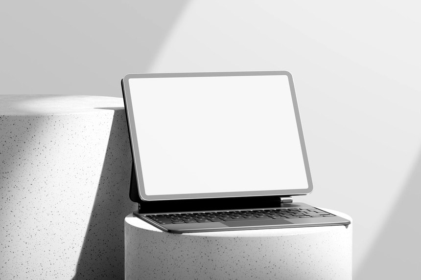 free ipad pro mockup on podium with magic keyboard