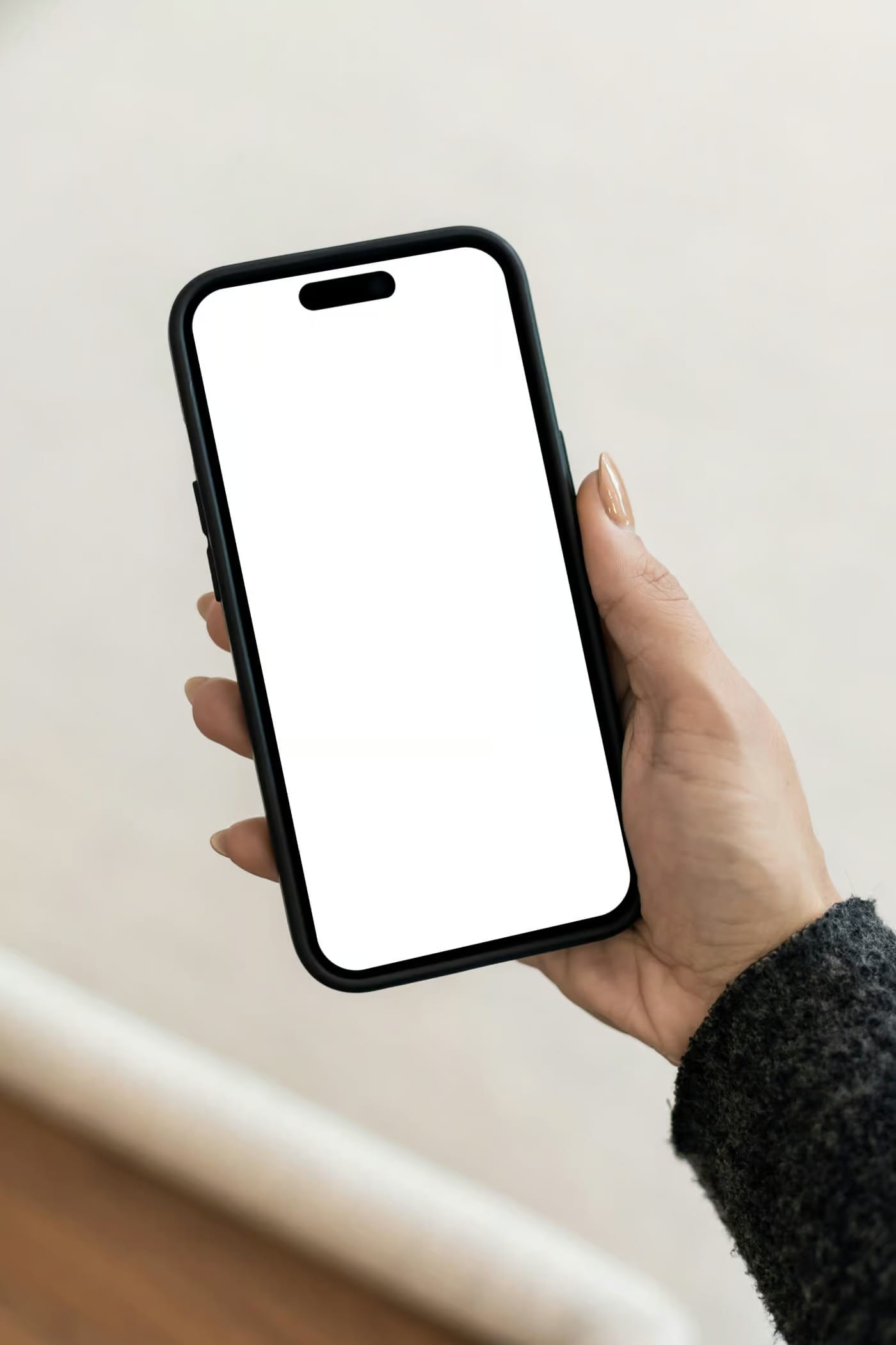 free iphone 14 pro mockup in hand