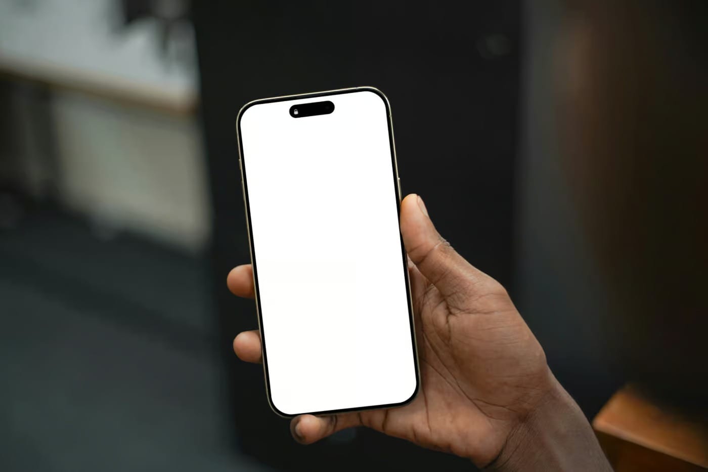 free iphone 16 pro mockup hand holding