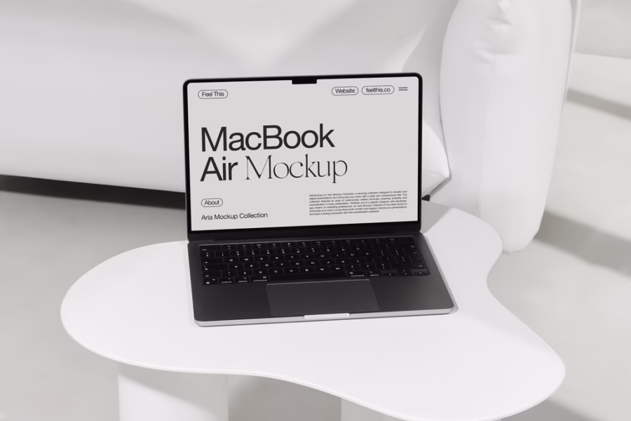 free macBook air mockup on coffee table