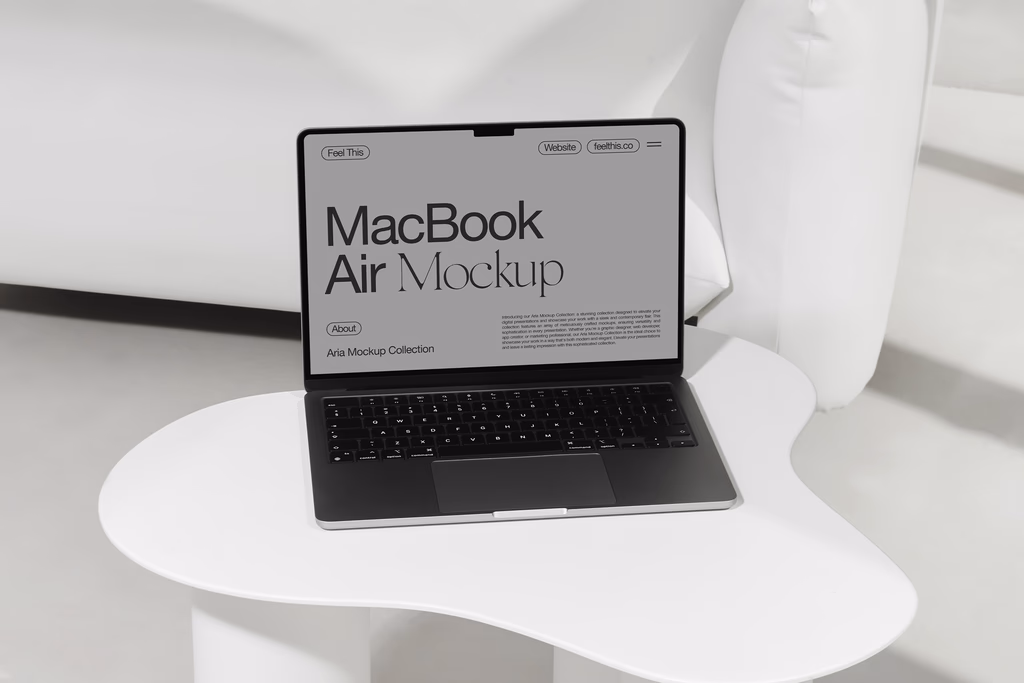free macBook air mockup on coffee table
