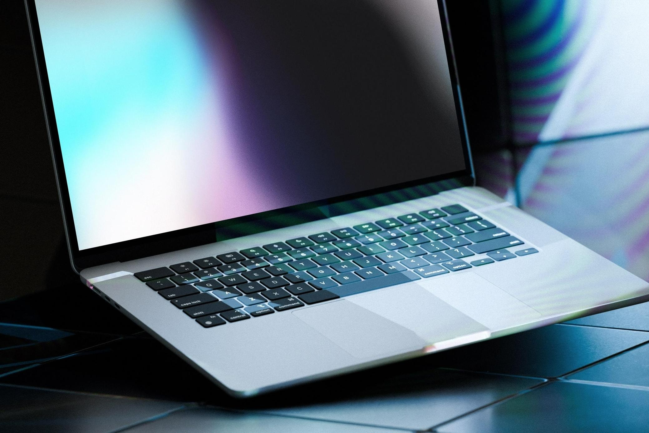free macbook air mockup with neon light