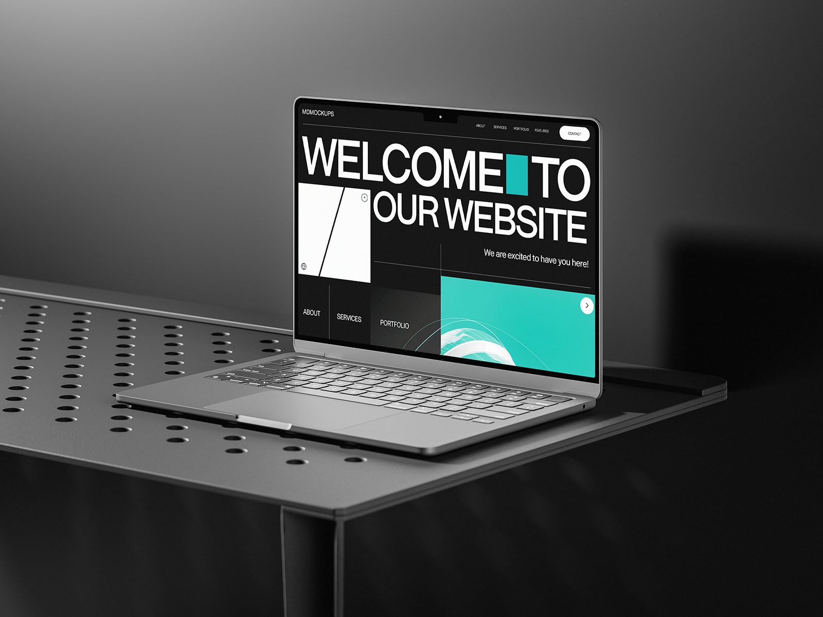 free macbook mockup on black table