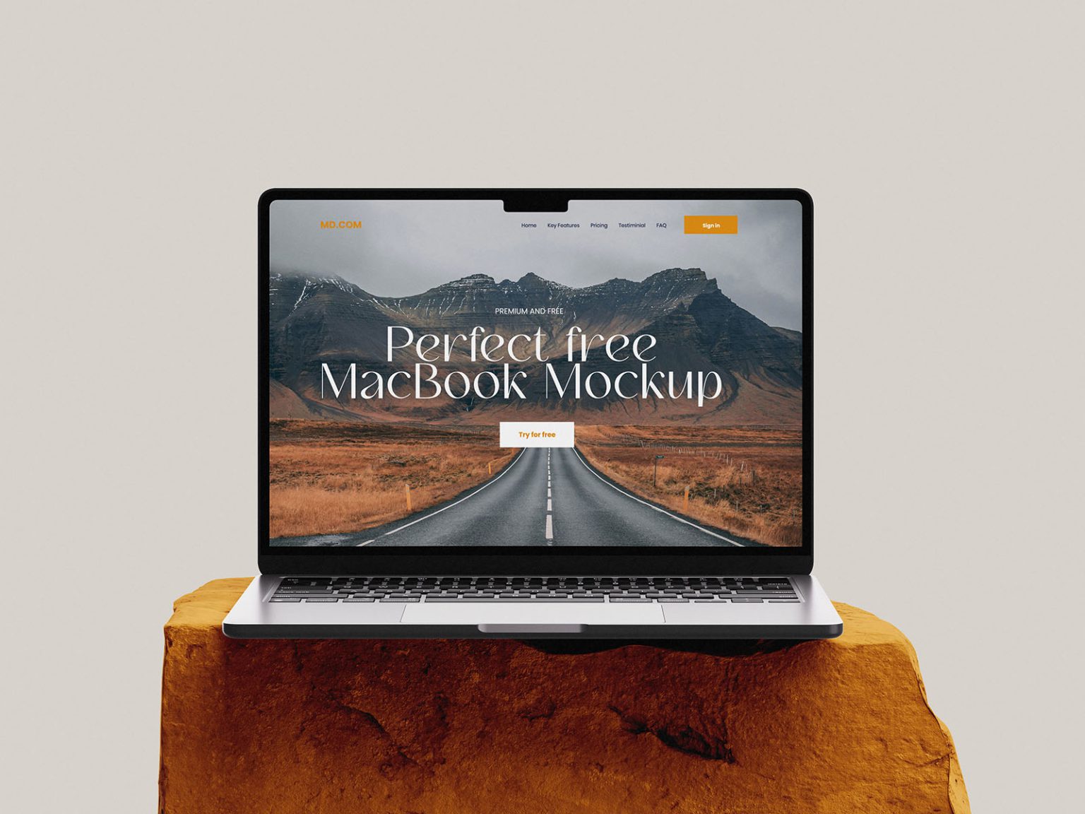 free macbook mockup on stone