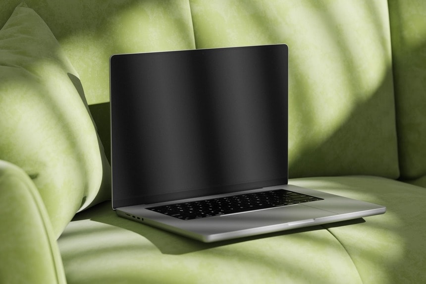 free macbook pro mockup on sofa