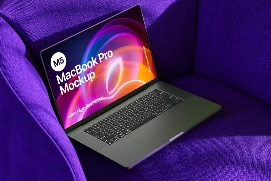 free macbook pro mockup on sofa