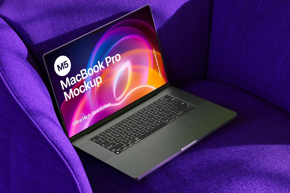 free macbook pro mockup on sofa
