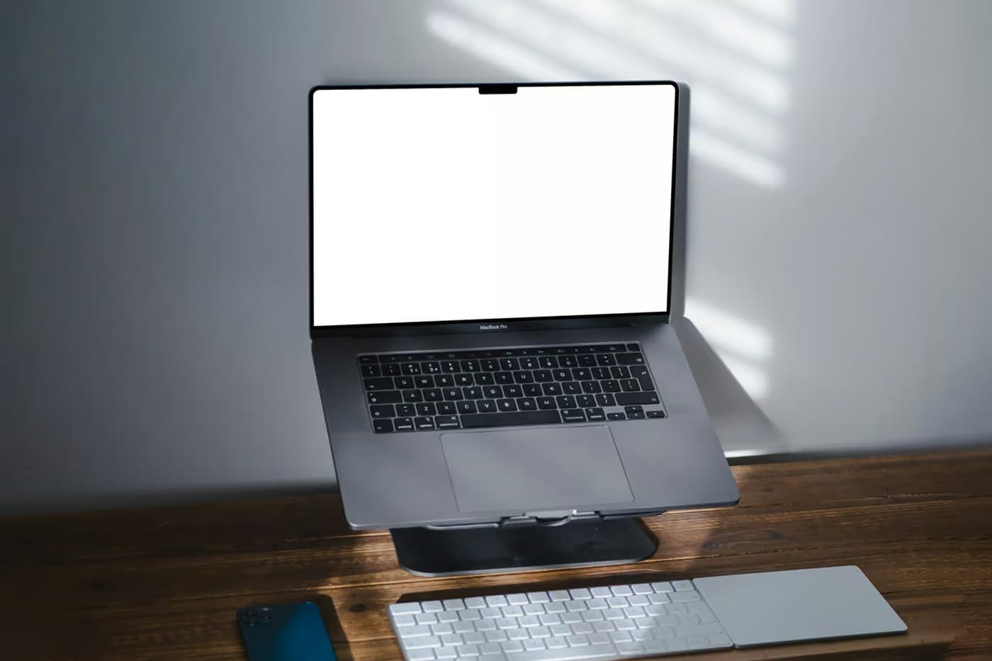 free macbook pro mockup on stand