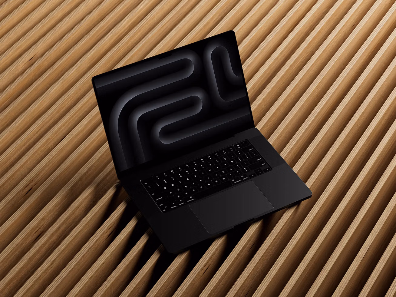 free macbook pro mockup on wood planks