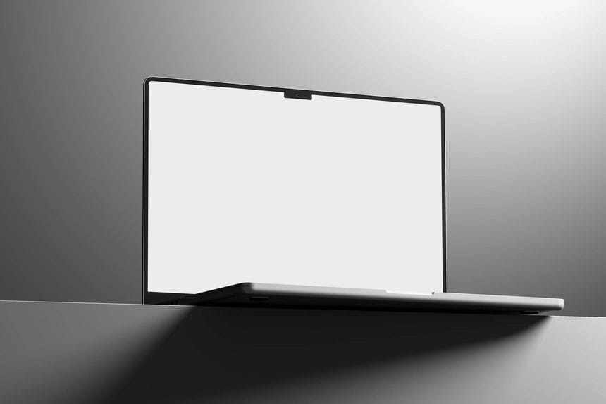 free macbook pro mockup with dark contrast lighting