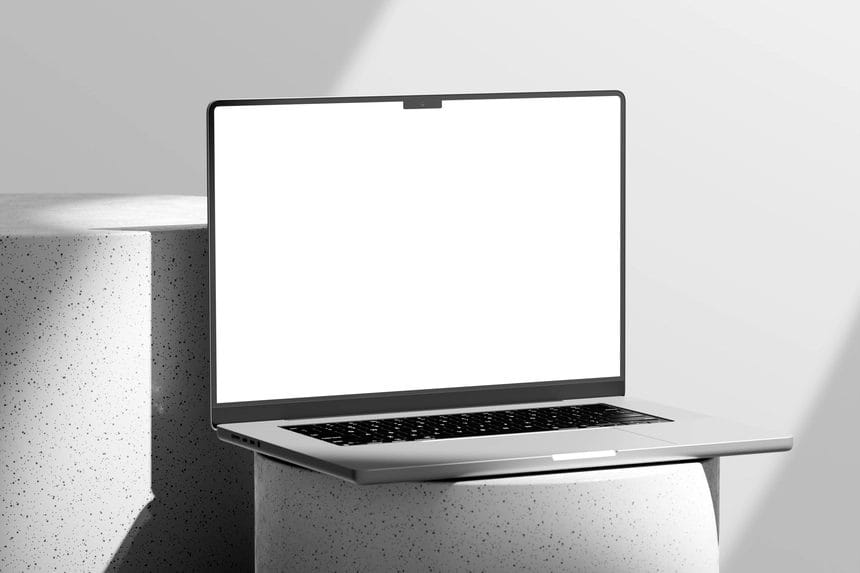 free macbook pro mockup on round podium
